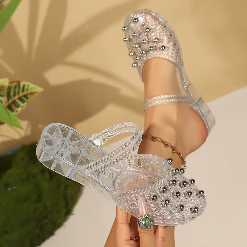 Woven Water-Drop Embellishments, Platform Heels, And a Strap Design